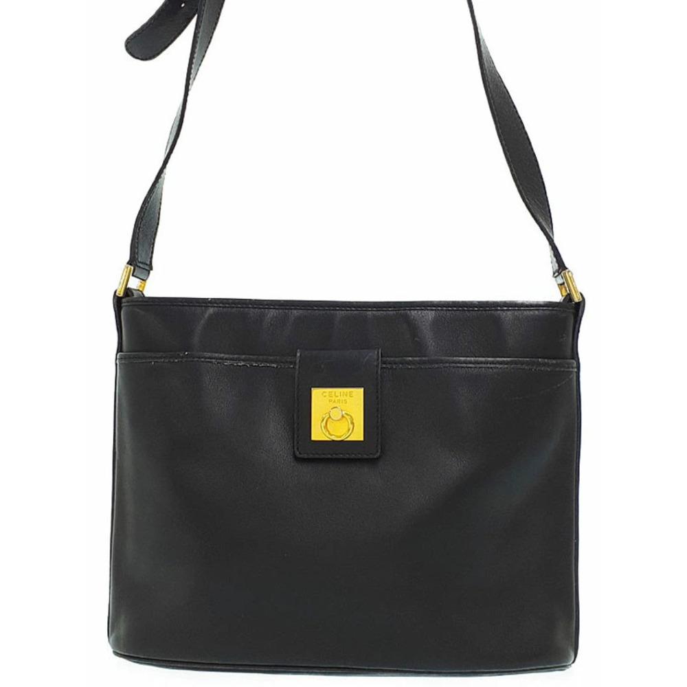 Celine Paris black leather handbag front pocket